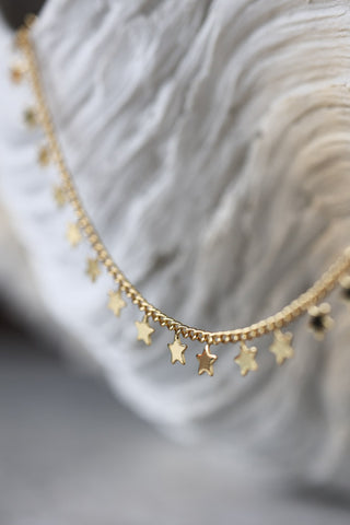 Detail image of the You're A Star Charm Gold Bracelet. 