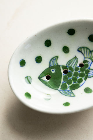 Close-up image of the White & Green Fish Soap Dish