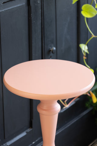 Close-up of the top of the Wood Turned Pink Side Table.