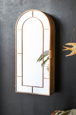 Lifestyle image of the Arched Copper Mirrored Wall Cabinet