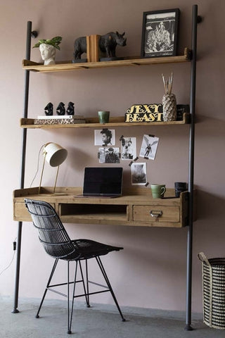 industrial style wood and metal desk with integrated shelves above.