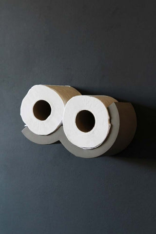 lifestyle image of Lyon Beton Concrete Cloud Toilet Roll Shelf - XS with toilet roll in on dark grey wall background