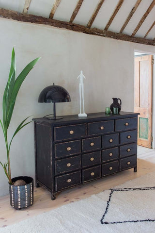 Angled lifestyle image of the Antique Style Black Multi-Drawer Storage Cabinet