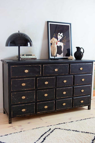 Angled close-up lifestyle image of the Antique Style Black Multi-Drawer Storage Cabinet