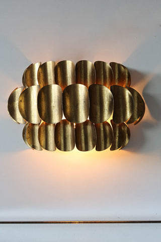 Detail image of the Antique Brass Curve Disc Wall Light