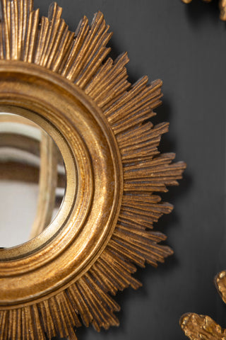 Close-up image of the Antique Gold Small Sun Convex round Mirror