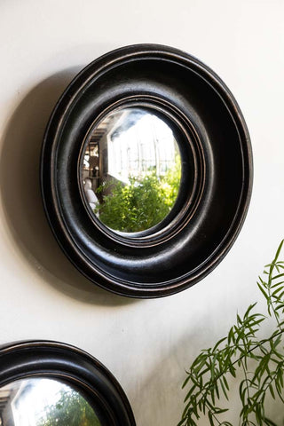 Lifestyle image of the Antique Black Deep Framed Small Convex wall Mirror