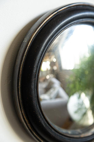 Close-up image of the Antique Black Round Framed Medium Convex wall Mirror.