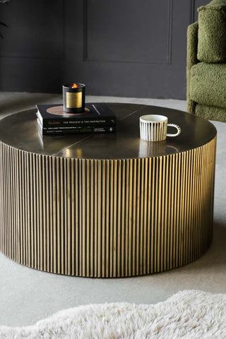 Close-up image of the Antique Brass Round Coffee Table