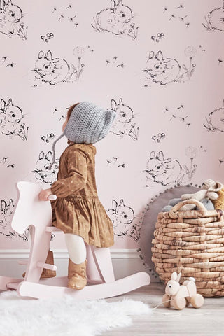 Lifestyle image of the Bear & Beau Little Bunny Wallpaper In Pink