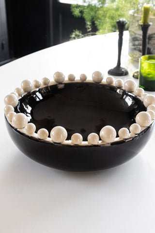 Lifestyle image of the Large Black & Cream Bobble Edged Bowl - Dia.37cm