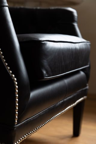 Image of the material for the Black Buttoned Back Leather Armchair