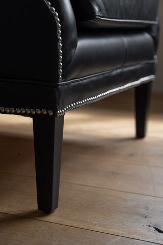 Image of the legs for the Black Buttoned Back Leather Armchair