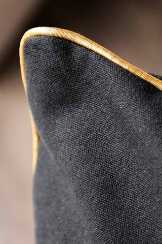 Image of the edge of the Black Star Embroidered Cushion