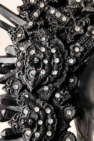 Image of the detail on the Black King Skull Ornament 