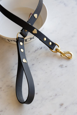 Close-up image of the Black Leather Dog Lead With Hearts