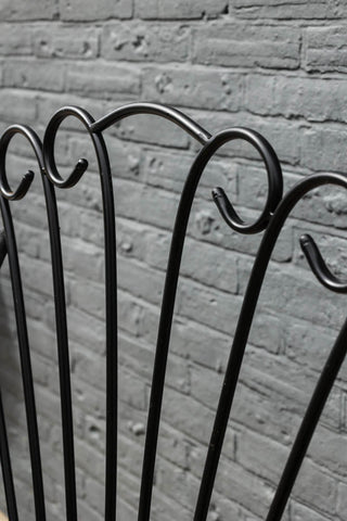 Detail image of the back of the Black Metal Garden Bench