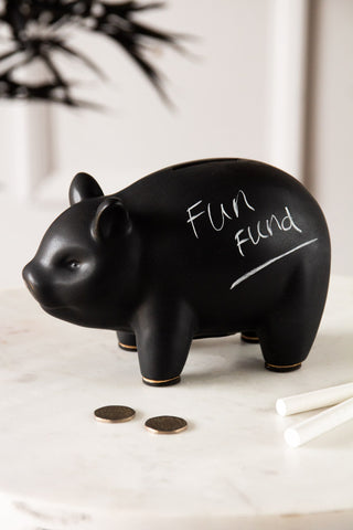 Lifestyle image of the Matt Black Chalkboard Piggy Bank
