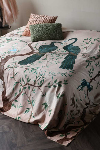 Angled image of the Cedomin Quilt Tapestry Throw In Pink