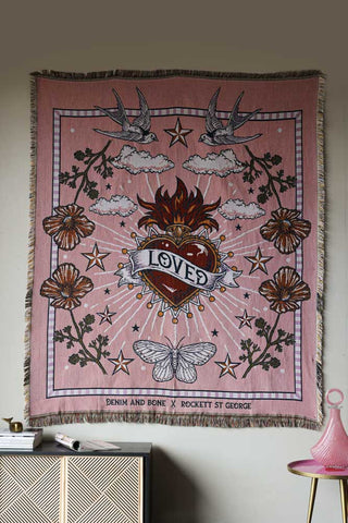 Lifestyle image of the Denim & Bone Pink Loved Woven Cotton Throw