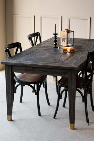 Lifestyle image of the Elm & Brass Dining Table