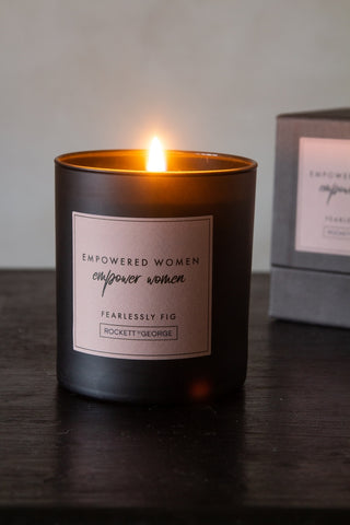 Image of the Rockett St George Empowered Woman Fig Candle lit