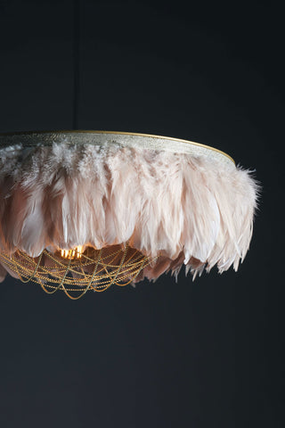 Close-up image of the Juliette Fabulous Feather Chandelier Featuring Chains in Blush Pink