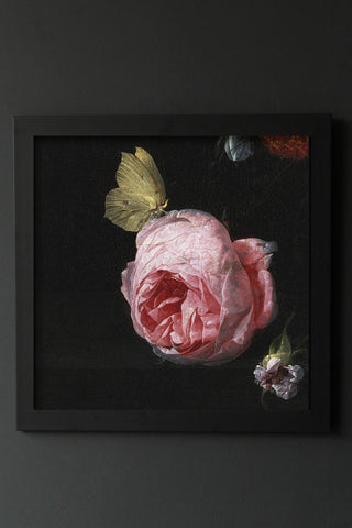 Image of the Framed Dark Rose Art Print hanging on the wall