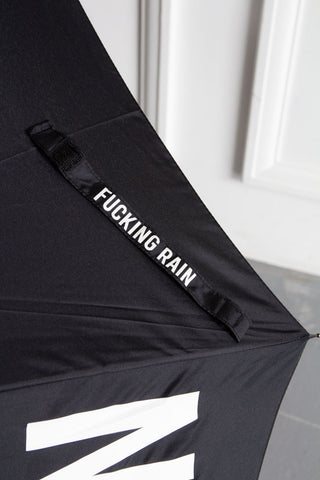 Image of the strap that keeps the Fucking Rain Umbrella together