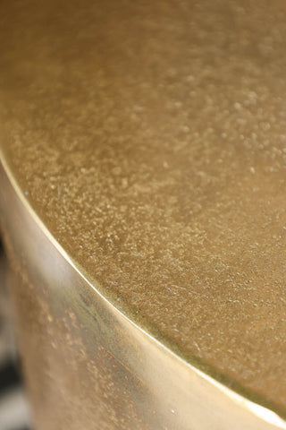 Detail image of the top of the Gold Drip Coffee Table