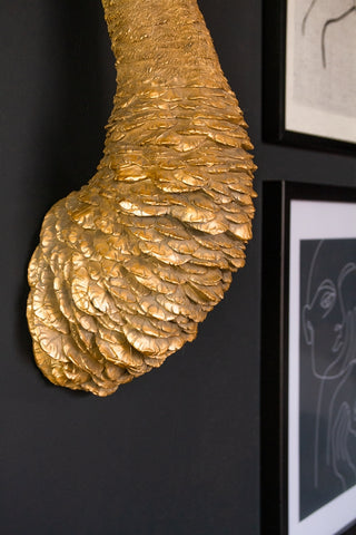 Close-up image of the neck and base on the Gold Ostrich Head Wall Decoration