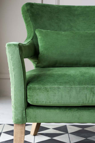 Close-up image of the Gorgeous Green Velvet Armchair