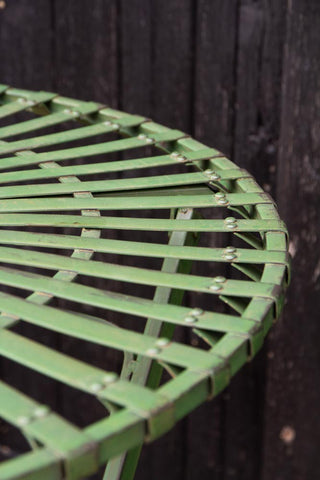 Close-up image of the rim of the table from the Green Metal Garden Table & Chair Set