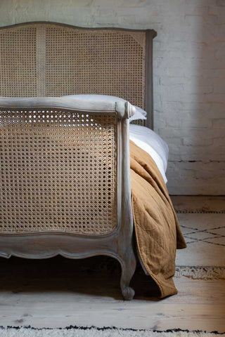 Close-up image of half the King Size Roll Top Woven Cane Bed