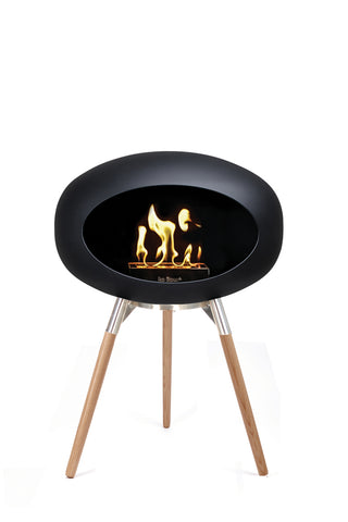 Image of the Le Feu Ground Wood Eco Fireplace lit on a white background 