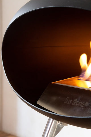Close-up image of the Le Feu Ground Wood Eco Fireplace lit