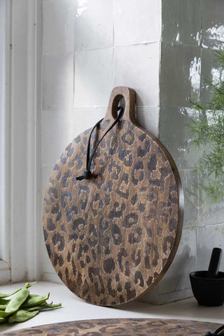Lifestyle image of the Leopard Print Mango Wood Serving Board - Small