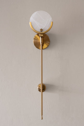 Front-on image of the Marble Disc & Brass Wall Light on the wall