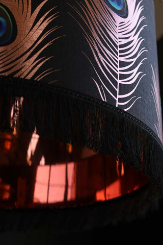 Image of the fringe looking up at the lining in the Mind The Gap Peacock Feather Lamp Shade