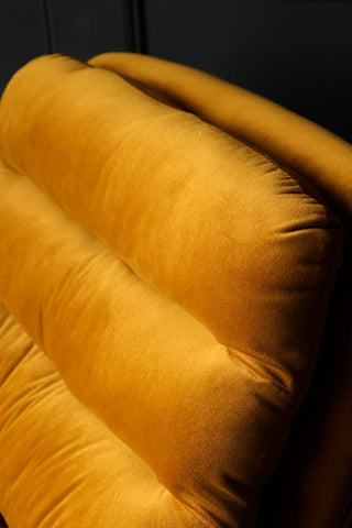 Close-up image of the Mustard Velvet Swivel Chair