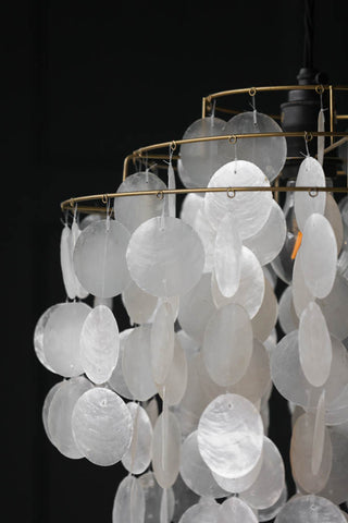 Close-up image of the Natural Shell Tiered Ceiling Light