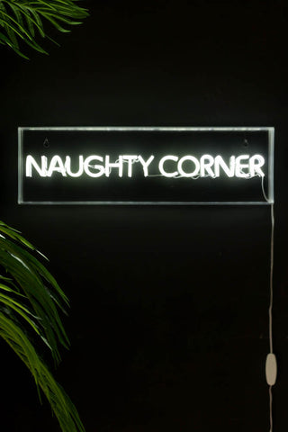 Lifestyle image of the Naughty Corner LED Neon Acrylic Light Box