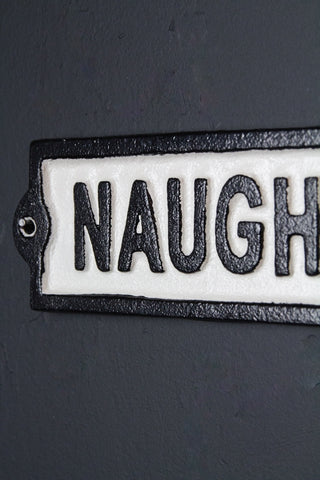 Close-up image of the Naughty Corner Sign