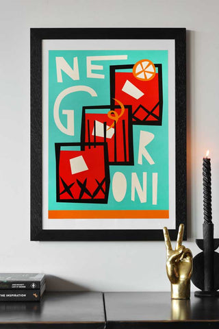 Lifestyle image of the Negroni By Fox & Velvet A2 Art Print With Black Wooden Frame