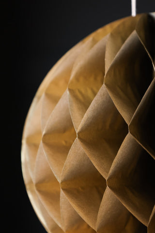 Close-up image of the Set Of 2 Gold Honeycomb Ball Decorations