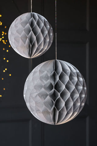 Lifestyle image of the Set Of 2 Silver Honeycomb Ball Decorations