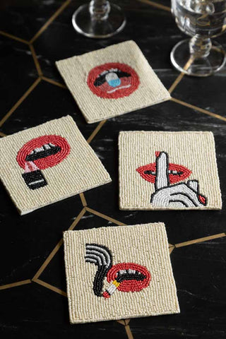 Lifestyle image of the Set Of 4 Beaded Red Lips Coasters