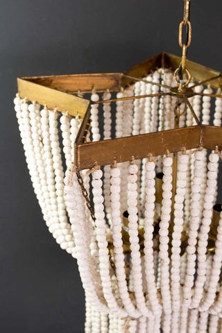 Close-up image of the top and the frame on the Star Shaped Beaded Statement Chandelier Light