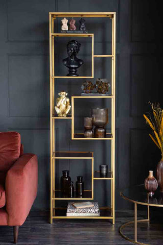 Lifestyle image of the Tall Gold & Glass Art Deco Shelving Unit
