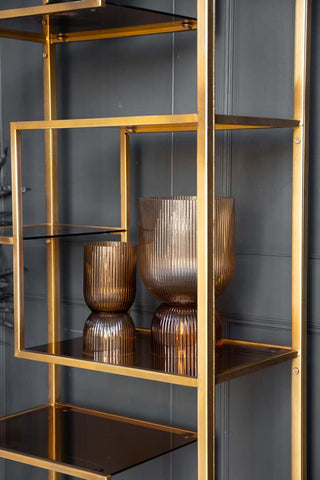 Angled image of the cube shelf on the Tall Gold & Glass Art Deco Shelving Unit